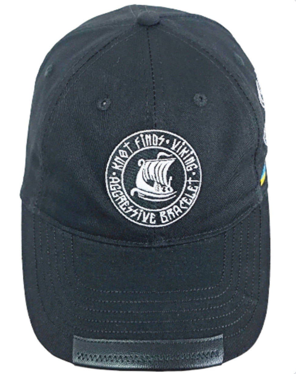 Black baseball cap with “Drakar Viking Ship” print. Stylish Scandinavian baseball cap with a print of the logo of the legendary brand “KNOTFinds”.
