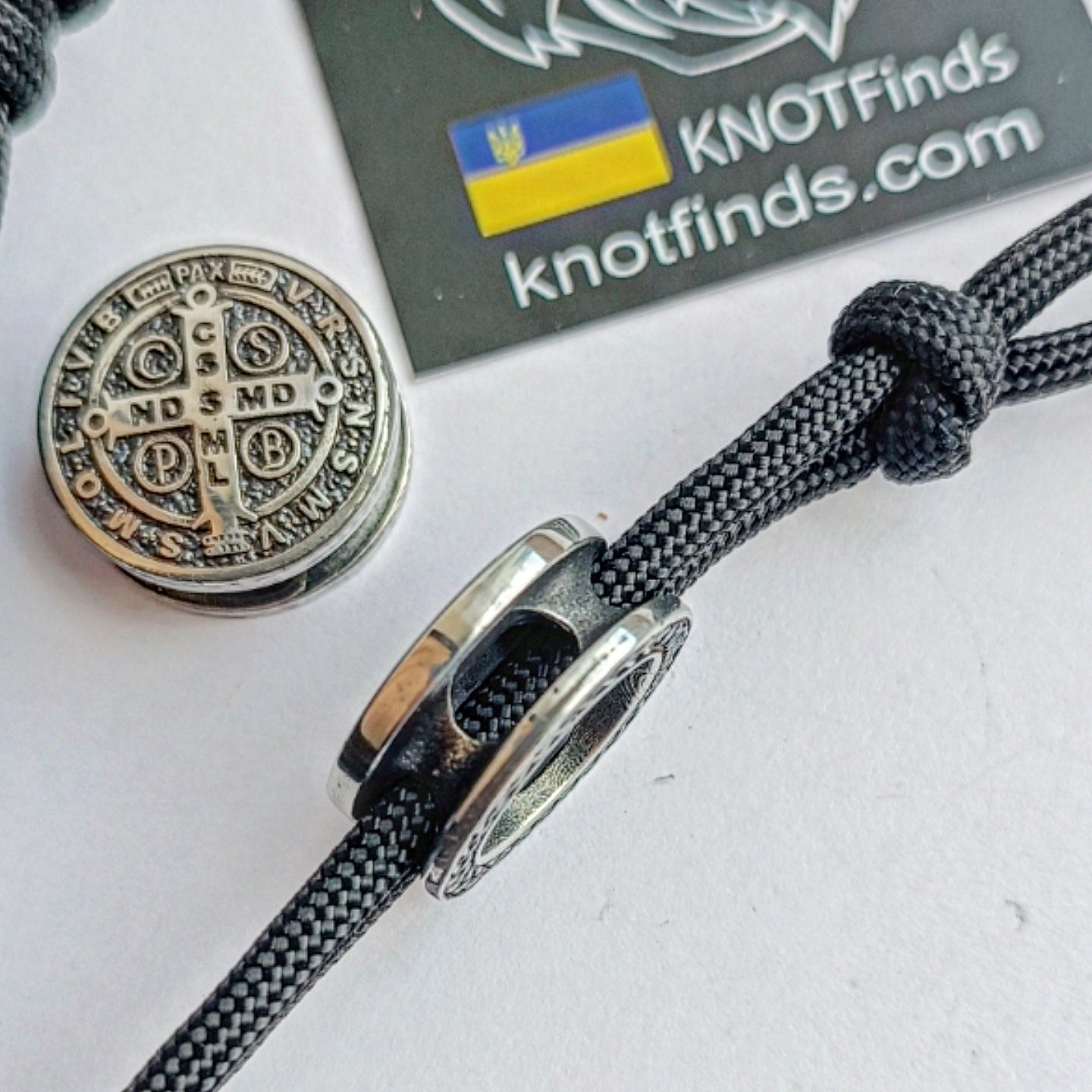 Cross of Saint Benedict. Exorcist. Steel bead for Paracord. Religious symbols. Catholicism. Vatican symbols.