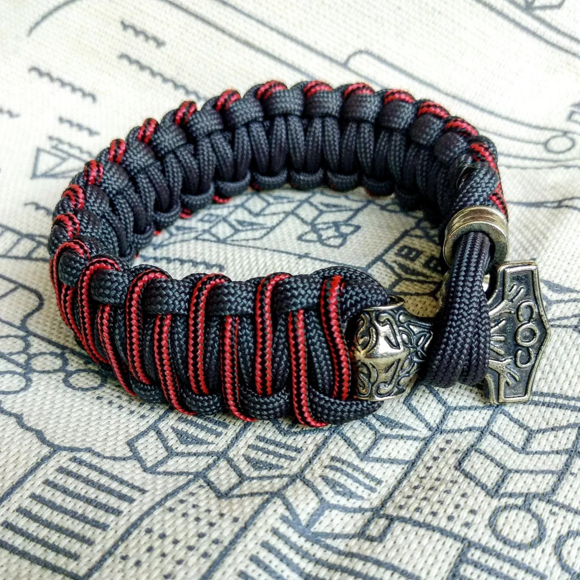 Graphite and bloody strip Nordic paracord bracelet "THOR'S HAMMER". A gift for men. Scandinavian style, Celtic knot.