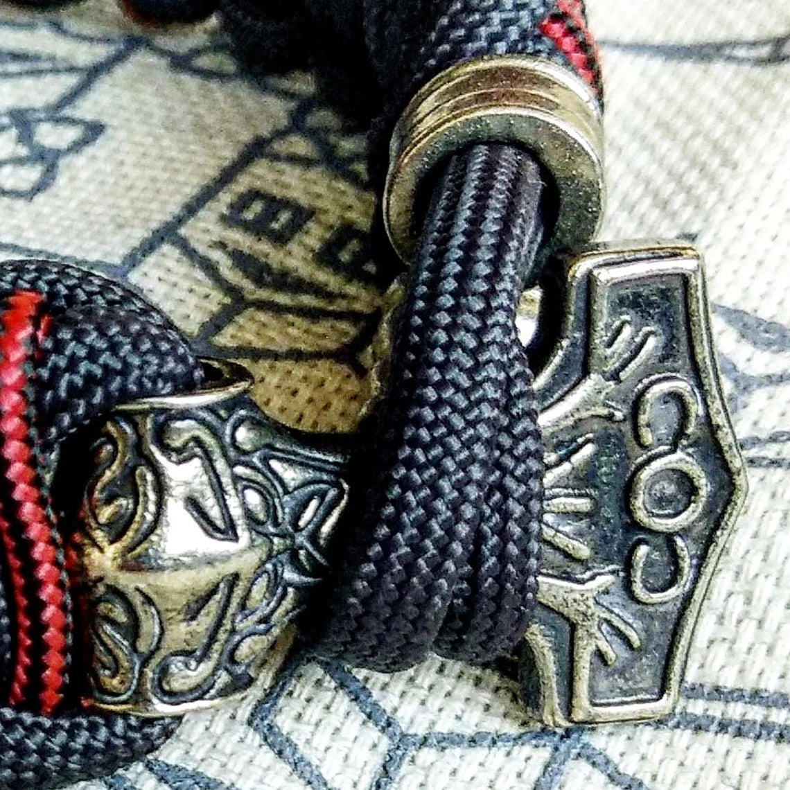 Graphite and bloody strip Nordic paracord bracelet "THOR'S HAMMER". A gift for men. Scandinavian style, Celtic knot.