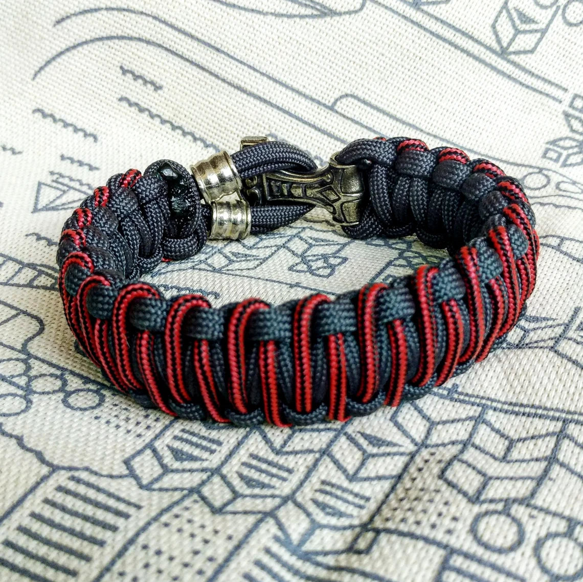 Graphite and bloody strip Nordic paracord bracelet "THOR'S HAMMER". A gift for men. Scandinavian style, Celtic knot.