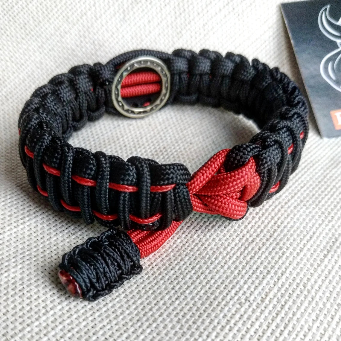 Nordic paracord bangle "VALKNUT". The original brutal bracelet made of Celtic knots and beads. Viking style.