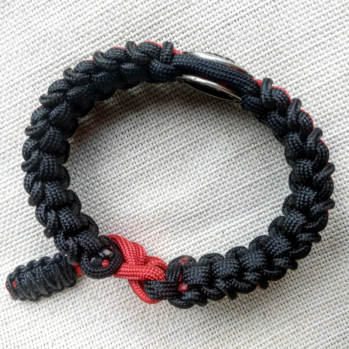 Nordic paracord bangle "VALKNUT". The original brutal bracelet made of Celtic knots and beads. Viking style.