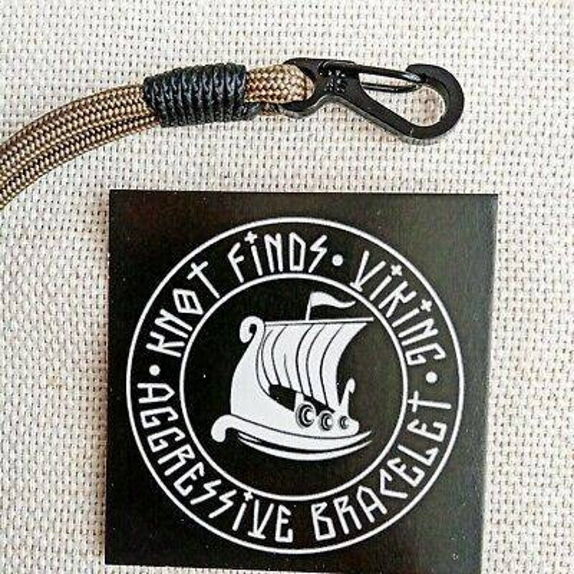 Thin military bracelet "EARTH" made of paracord and carbine for men. Army style.