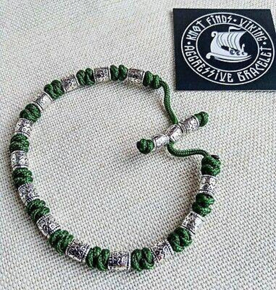 Charming bracelet, Paracord jewelry. Paracord bracelet with beads. Beads with ornaments.