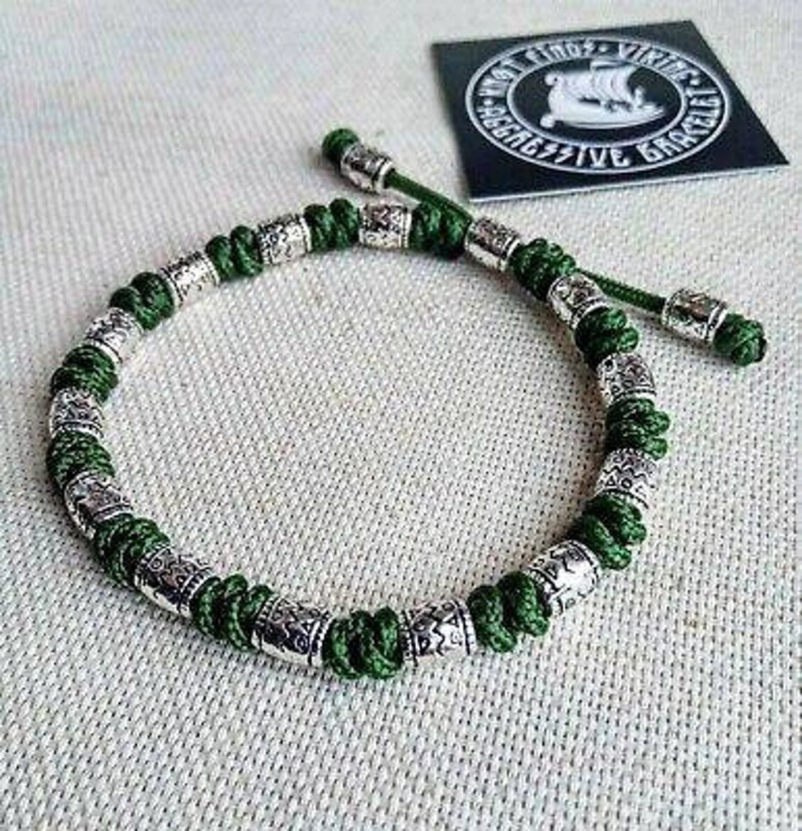 Charming bracelet, Paracord jewelry. Paracord bracelet with beads. Beads with ornaments.