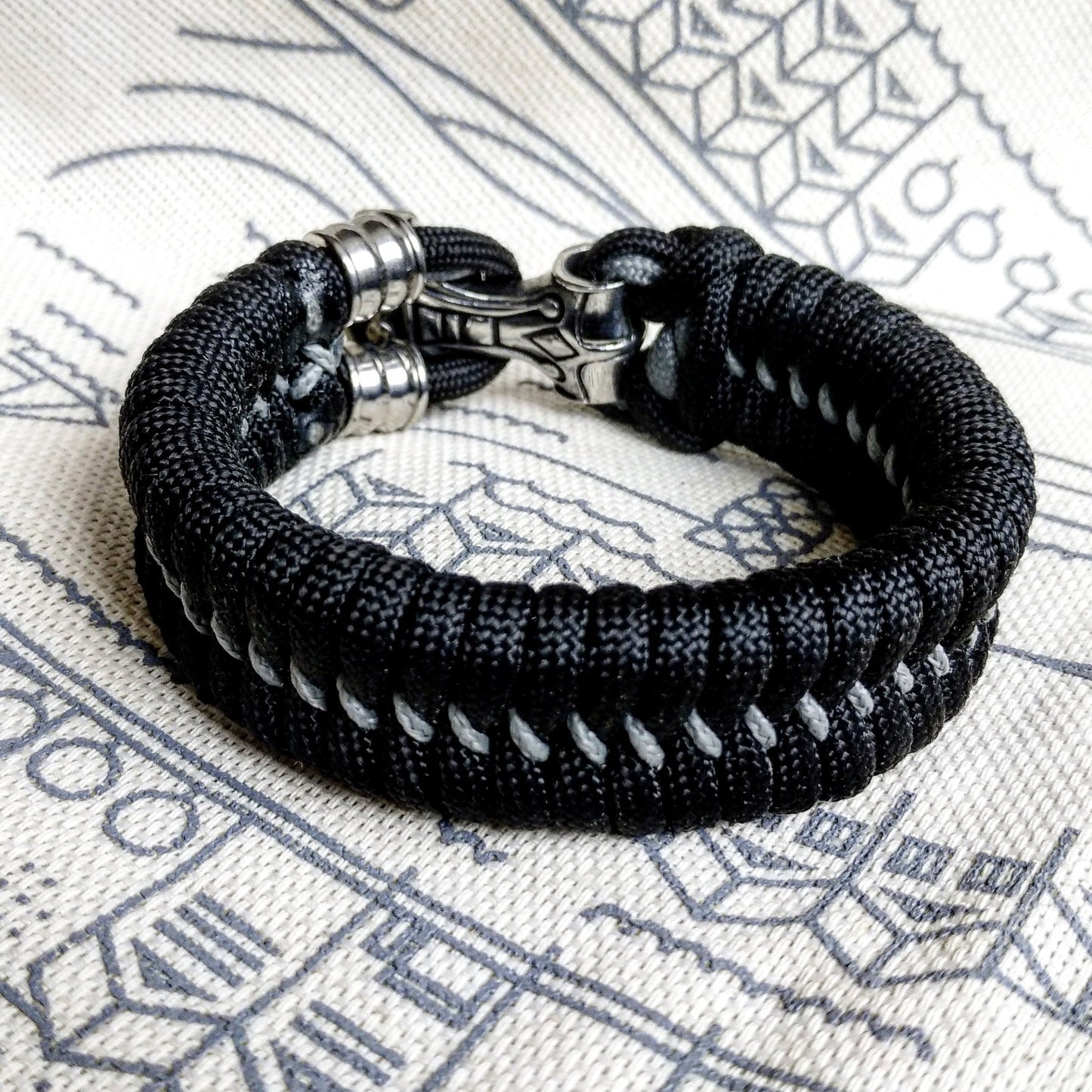 Black Nordic paracord bracelet "THOR'S HAMMER". A gift for men. Scandinavian style, Celtic knot.