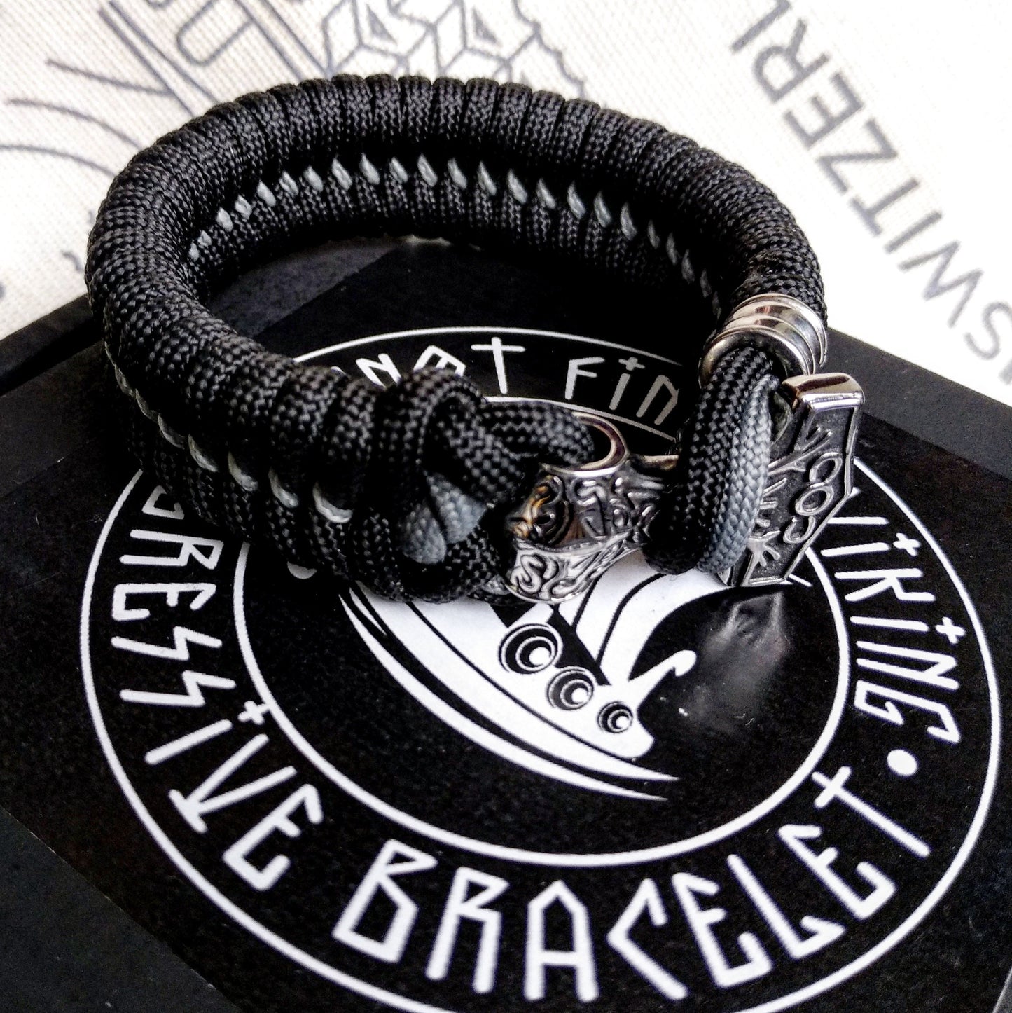 Black Nordic paracord bracelet "THOR'S HAMMER". A gift for men. Scandinavian style, Celtic knot.