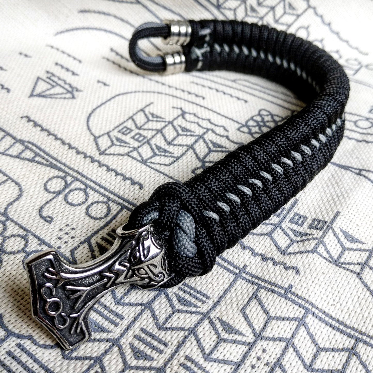 Black Nordic paracord bracelet "THOR'S HAMMER". A gift for men. Scandinavian style, Celtic knot.