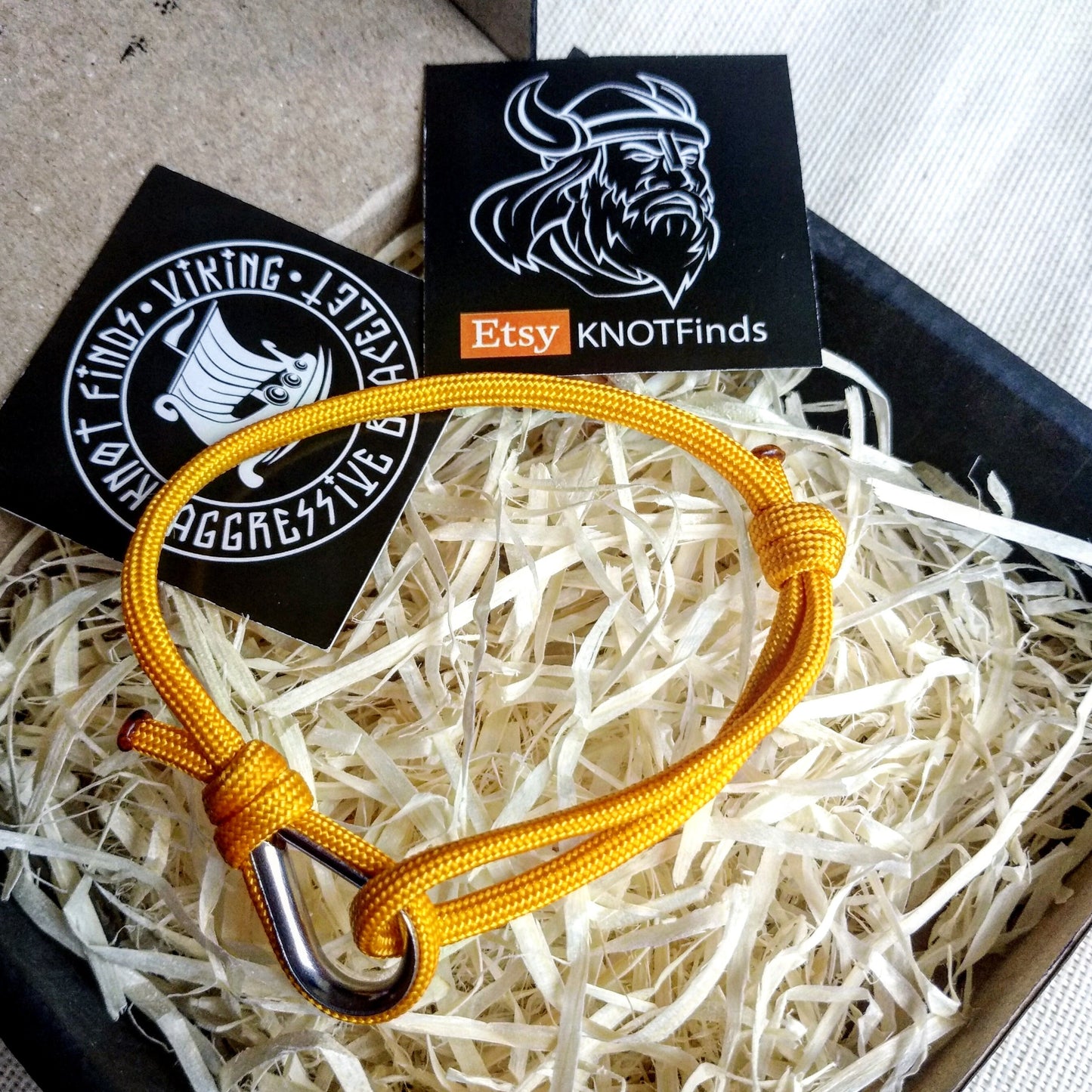Yellow thin bracelet made of paracord and Celtic knots. Stylish bracelet for men and women. A gift for a surfer, diver, skydiver.