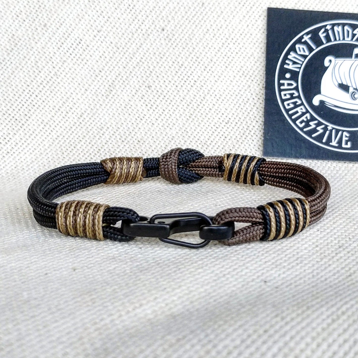Thin Viking paracord bracelet with a carabiner. Made of parachute cord and celtic knots. Gift to a friend for his birthday.