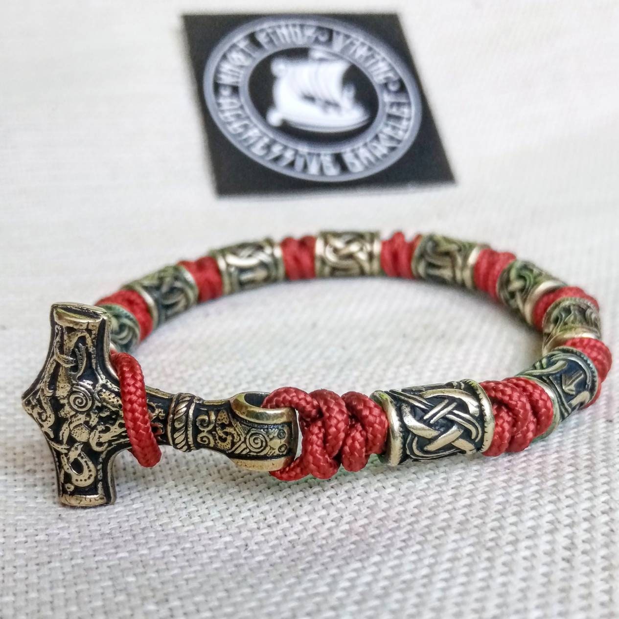 Red Paracord bracelet. Runic bangle, Viking style. Scandinavian jewelry. Mjöllnir.