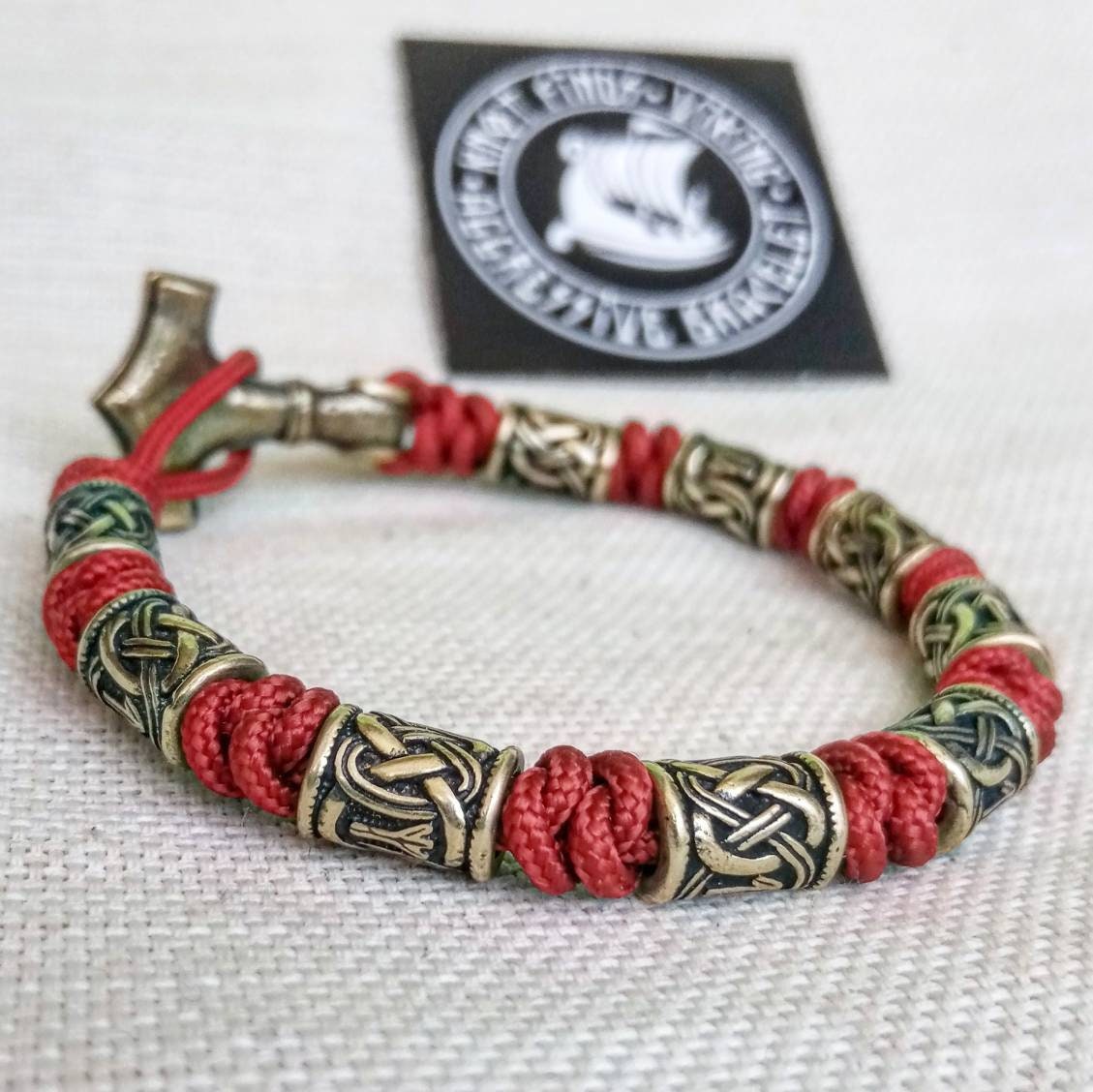 Red Paracord bracelet. Runic bangle, Viking style. Scandinavian jewelry. Mjöllnir.