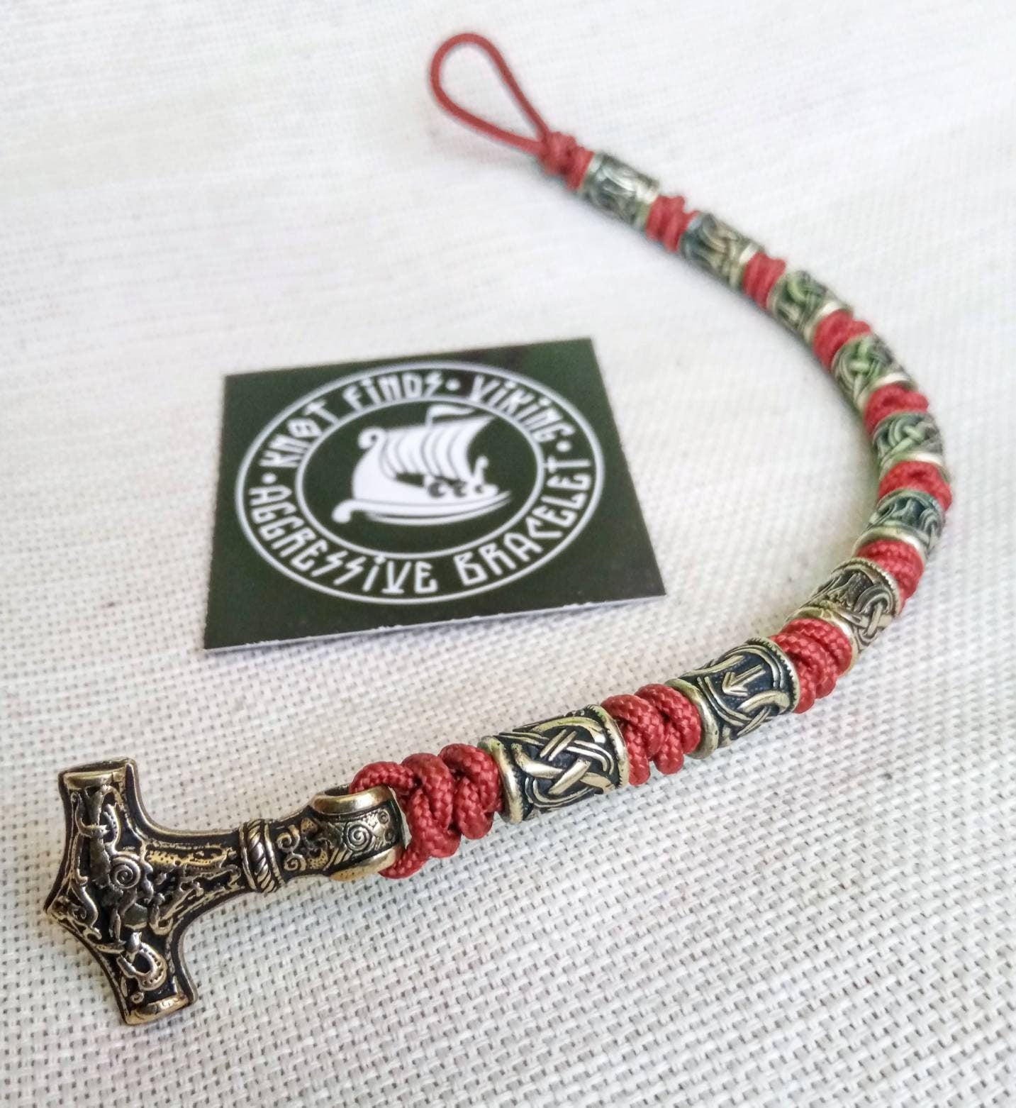 Red Paracord bracelet. Runic bangle, Viking style. Scandinavian jewelry. Mjöllnir.