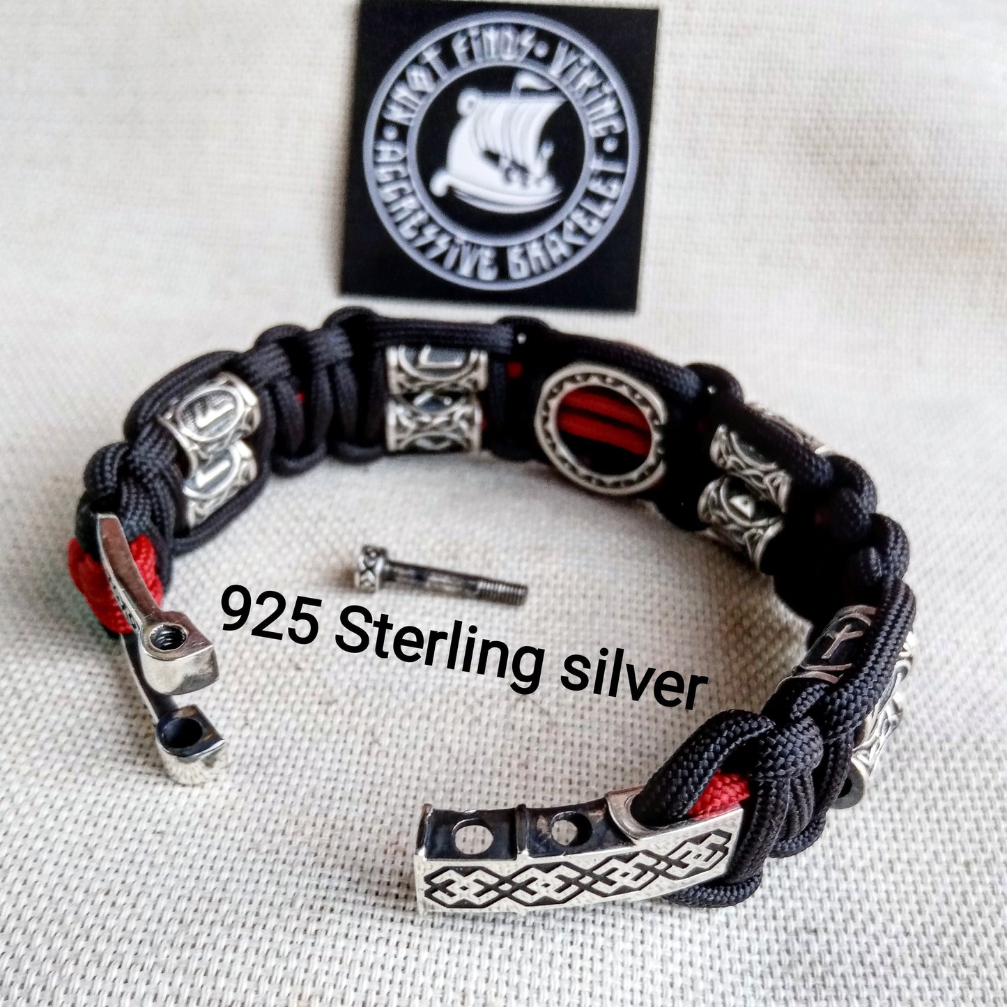 Luxury gift for biker. Runic paracord bracelet.925 Sterling silver runes. Viking jewelry.