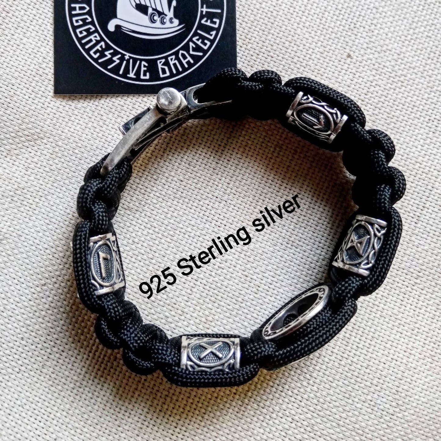 Black Viking protective amulet. Luxury gift for biker. Runic paracord bracelet.925 Sterling silver runes. Viking jewelry.
