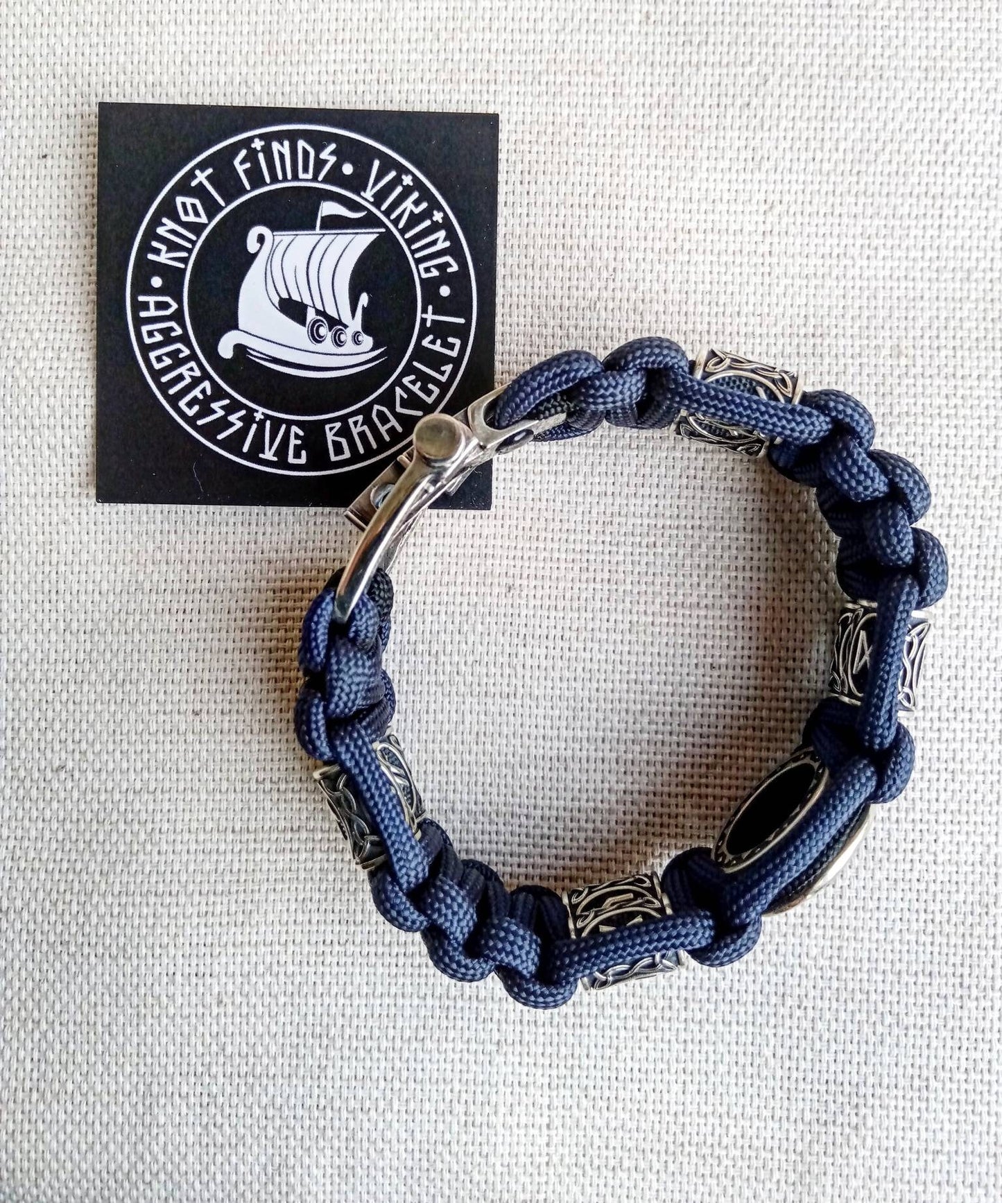 Runic paracord bracelet.Valknut symbol.