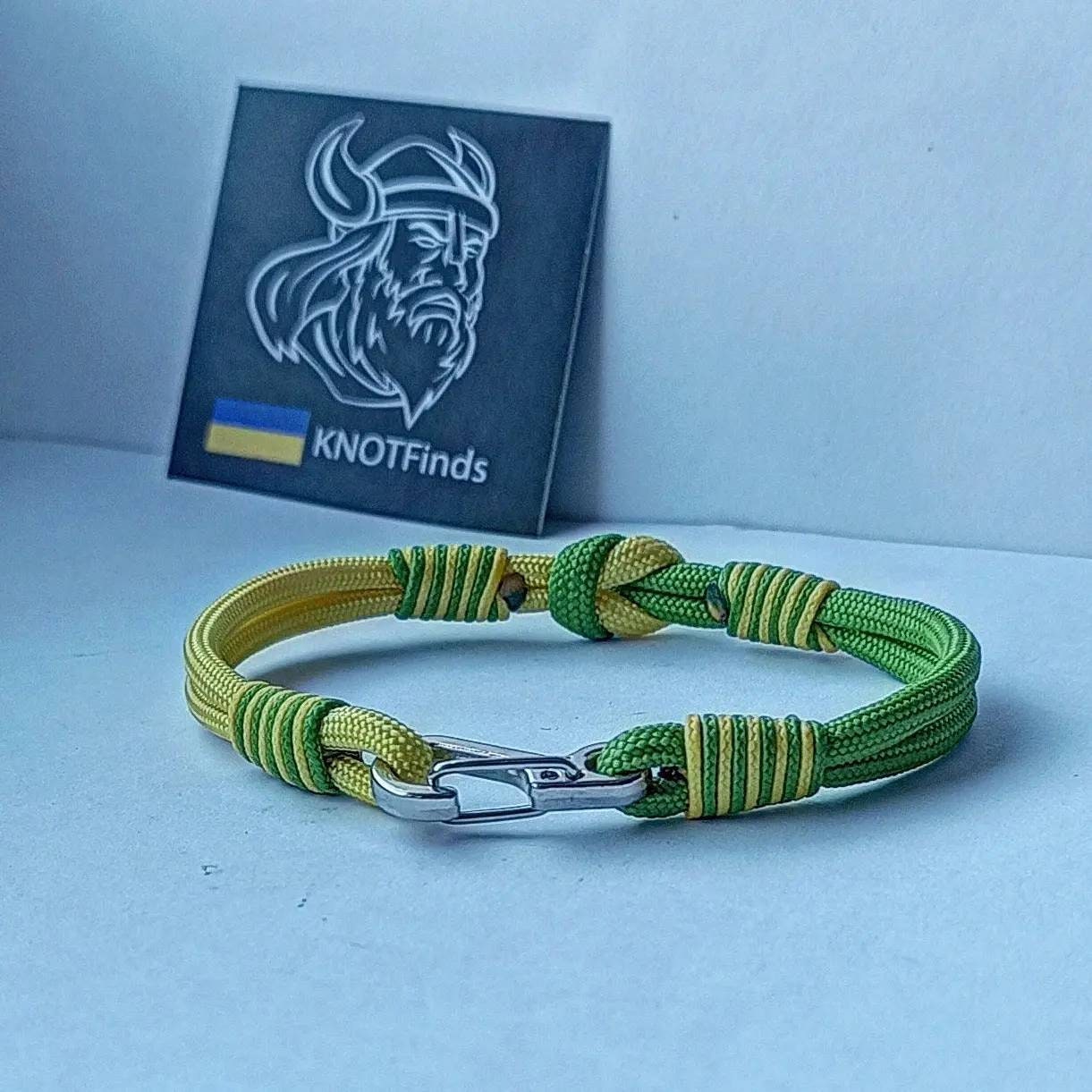 Thin yellow and green mint Nordic paracord bangle with a carabiner. Extreme durable. Gift to a friend for his birthday.