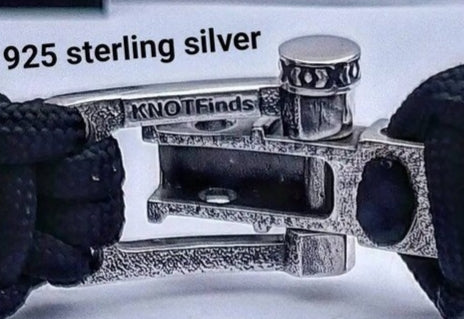 A clasp for paracord or leather bracelets. 925 sterling silver. Viking-inspired sterling silver beads. Handcrafted Viking-inspired jewelry for those seeking unique and stylish accessories.