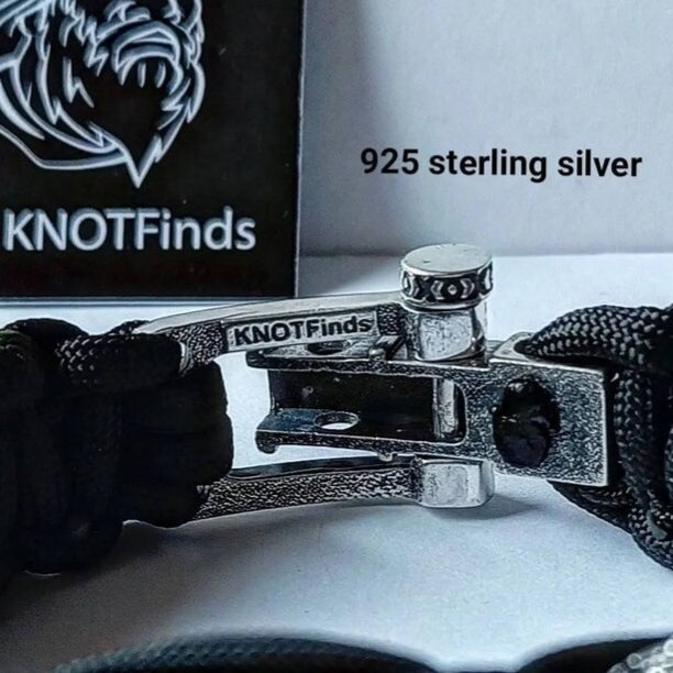 A clasp for paracord or leather bracelets. 925 sterling silver. Viking-inspired sterling silver beads. Handcrafted Viking-inspired jewelry for those seeking unique and stylish accessories.