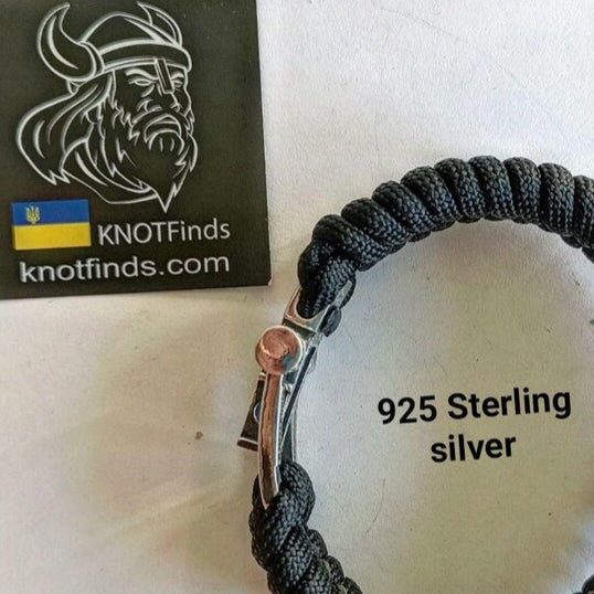 A clasp for paracord or leather bracelets. 925 sterling silver. Viking-inspired sterling silver beads. Handcrafted Viking-inspired jewelry for those seeking unique and stylish accessories.