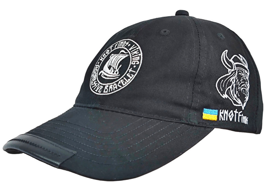 Black baseball cap with “Drakar Viking Ship” print. Stylish Scandinavian baseball cap with a print of the logo of the legendary brand “KNOTFinds”.