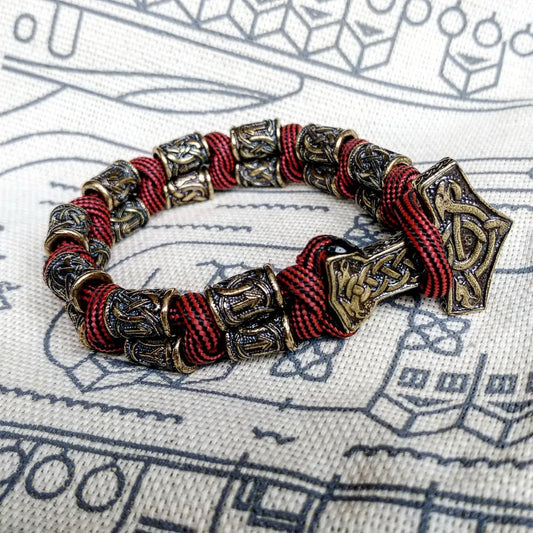 Runic bracelet "VIKING" from a paracord with a clasp "THOR'S HAMMER".  Runes  "teyvaz" and "algiz". Viking style.