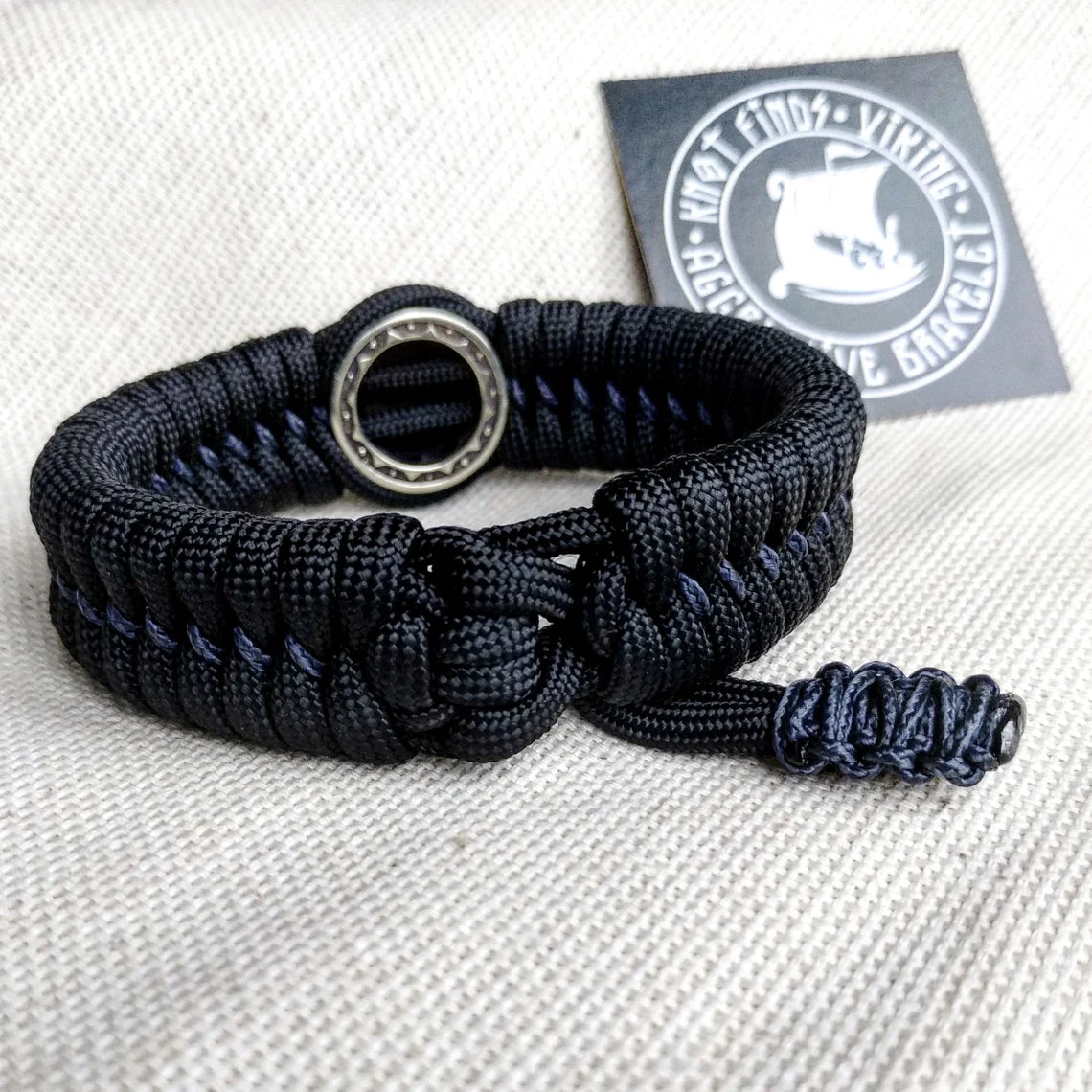 Nordic paracord bangle "VALKNUT". The original brutal bracelet made of Celtic knots and beads. Viking style.