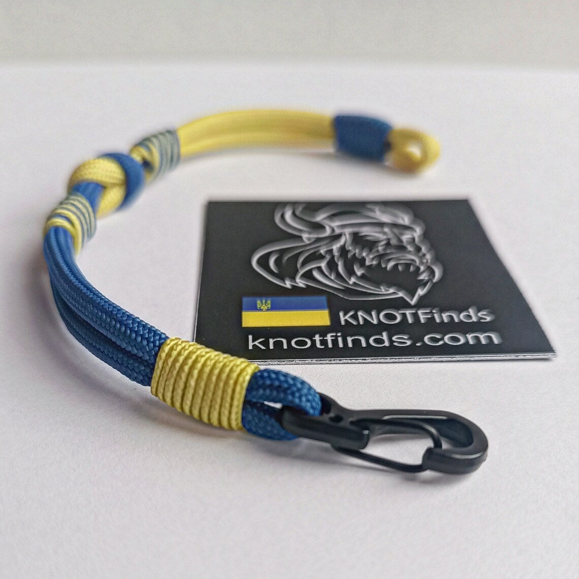 Ukrainian solidarity bracelet. Ukrainian flag. Thin paracord bracelet with a carbine. Ukrainian patriot bracelet. Royal blue and yellow bangle. Made of parachute cord and celtic knots. Symbol of Ukraine. Gift for yours friends.