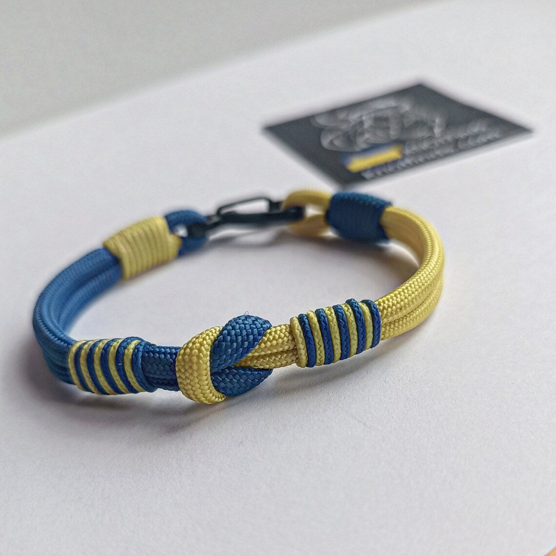 Ukrainian solidarity bracelet. Ukrainian flag. Thin paracord bracelet with a carbine. Ukrainian patriot bracelet. Royal blue and yellow bangle. Made of parachute cord and celtic knots. Symbol of Ukraine. Gift for yours friends.