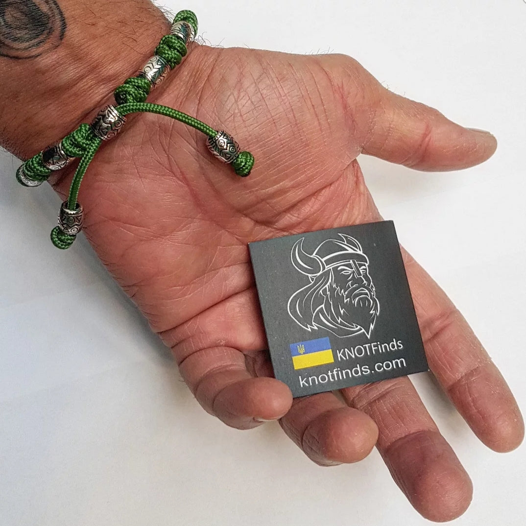 Charming bracelet, Paracord jewelry. Paracord bracelet with beads. Beads with ornaments.