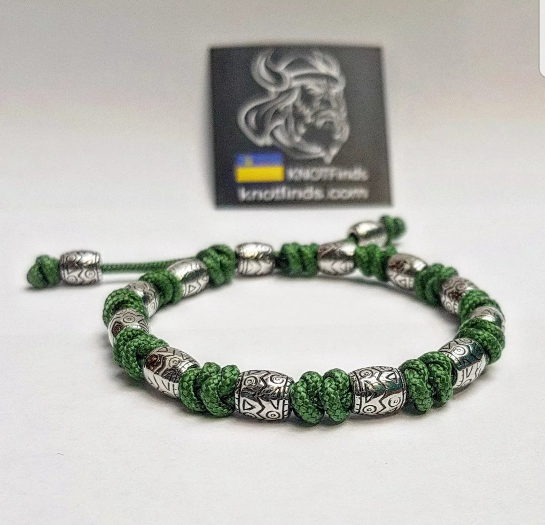 Charming bracelet, Paracord jewelry. Paracord bracelet with beads. Beads with ornaments.