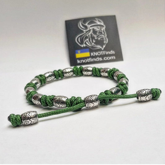 Charming bracelet, Paracord jewelry. Paracord bracelet with beads. Beads with ornaments.