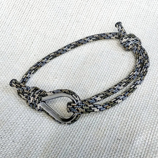 Stylish thin handmade bracelet made of paracord and Celtic knots. A great gift for friends, for divers, for surfers and skydivers.