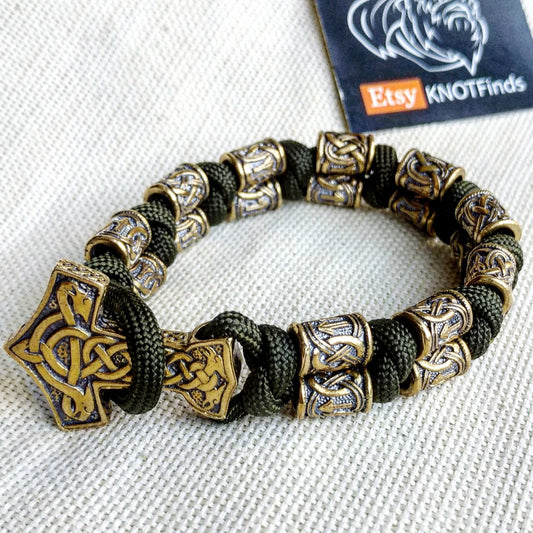 Runic bracelet "VIKING" from a paracord with a clasp "THOR'S HAMMER".  Runes  "teyvaz" and "algiz". Viking style.