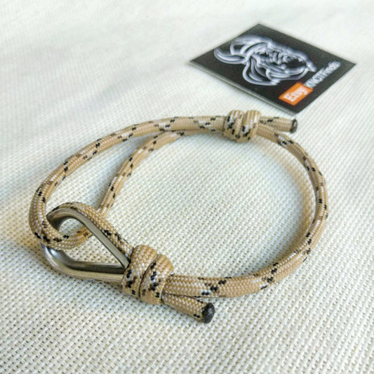 Desert camo thin bracelet made of paracord and Celtic knots. Stylish bracelet for men and women. A gift for a surfer, diver, skydiver.