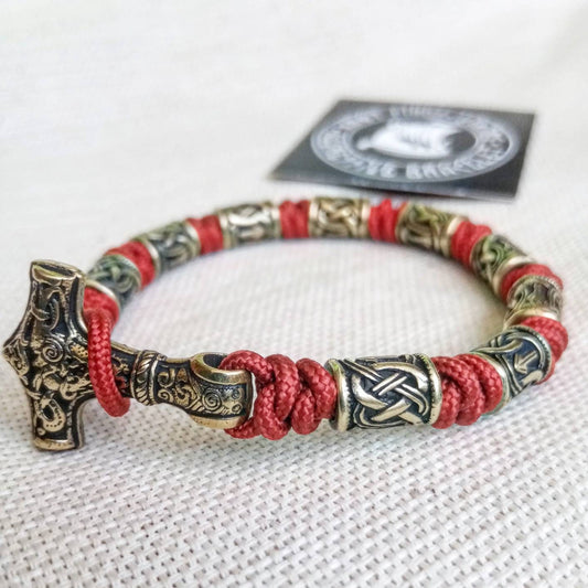 Red Paracord bracelet. Runic bangle, Viking style. Scandinavian jewelry. Mjöllnir.