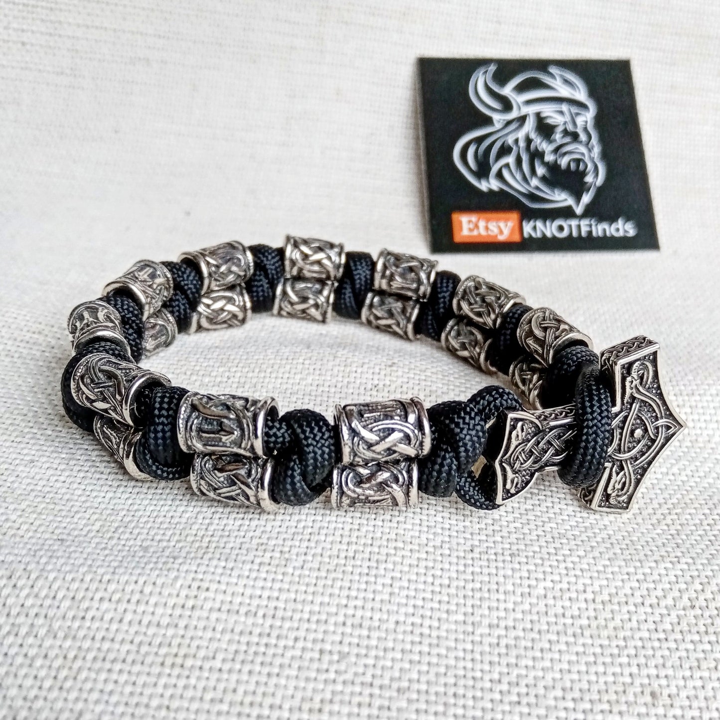 Runed steel beads, Thor's Hammer, black paracord 550. Set for weaving a bracelet from paracord.  DIY gift.  Do it yourself.