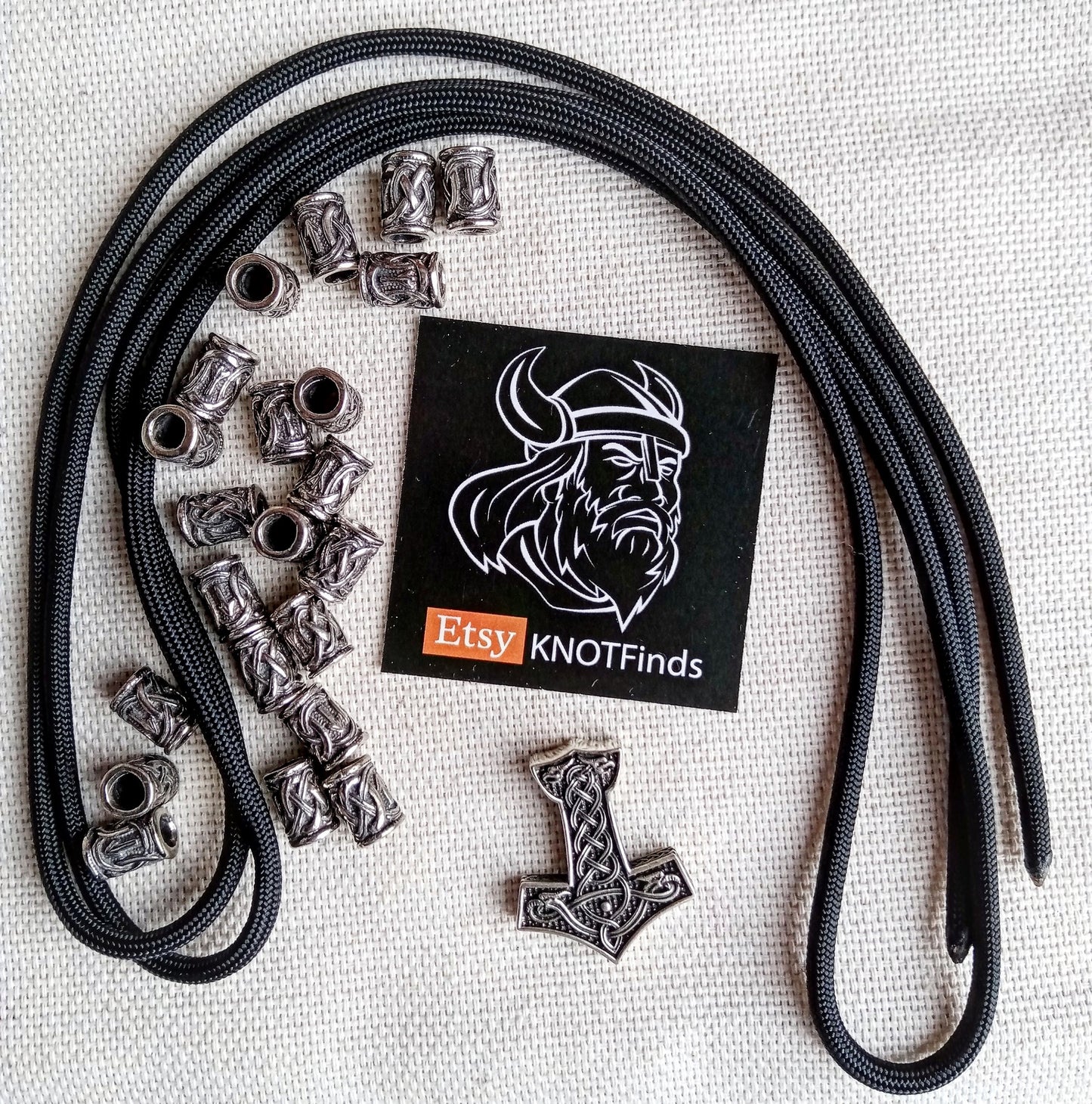 Runed steel beads, Thor's Hammer, black paracord 550. Set for weaving a bracelet from paracord.  DIY gift.  Do it yourself.