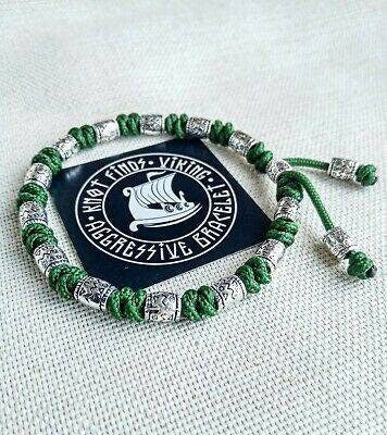 Charming bracelet, Paracord jewelry. Paracord bracelet with beads. Beads with ornaments.